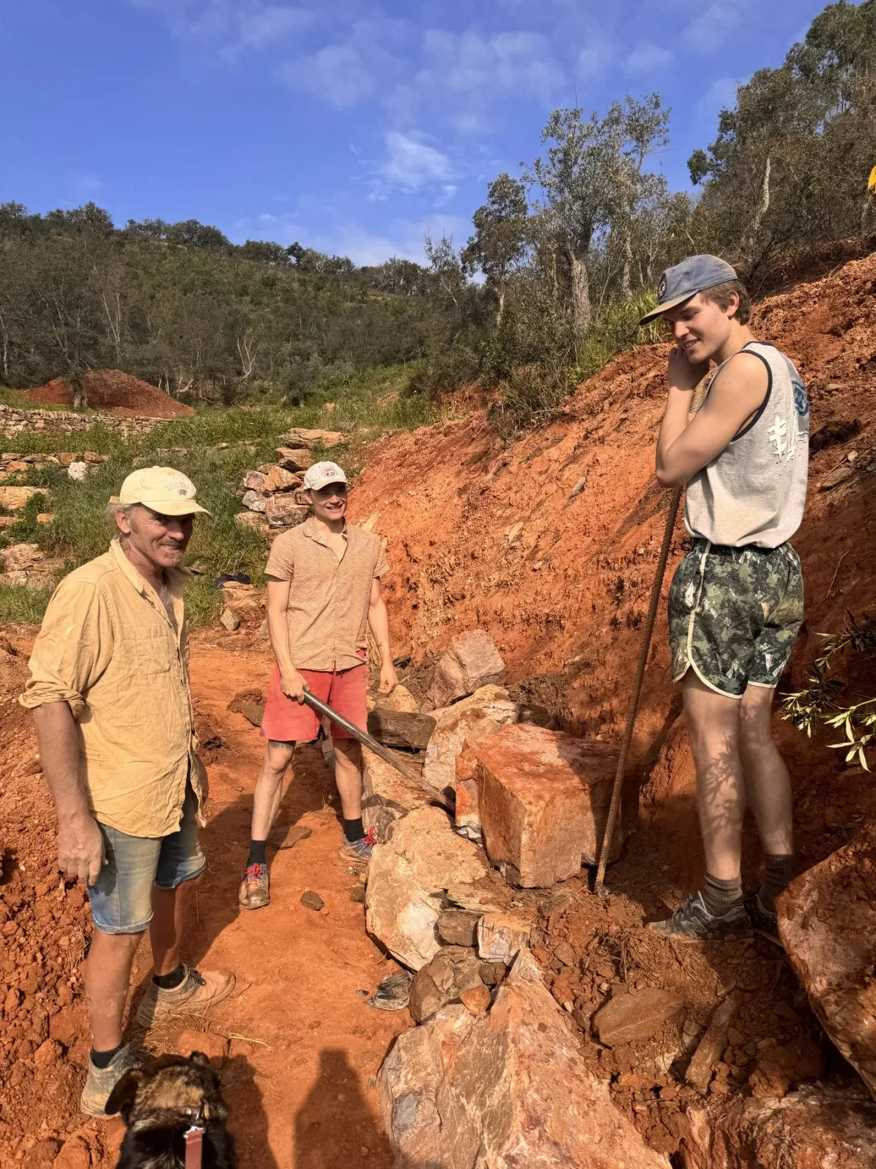 The crew at the stone face in the Alentejo hills